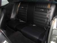 rearseatblackvinylwithcarbonfiberinsertsandponydecorations_small.jpg